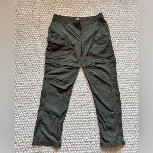 REI Women’s Forest Green Cargo Pants with leg zippers to convert into shorts